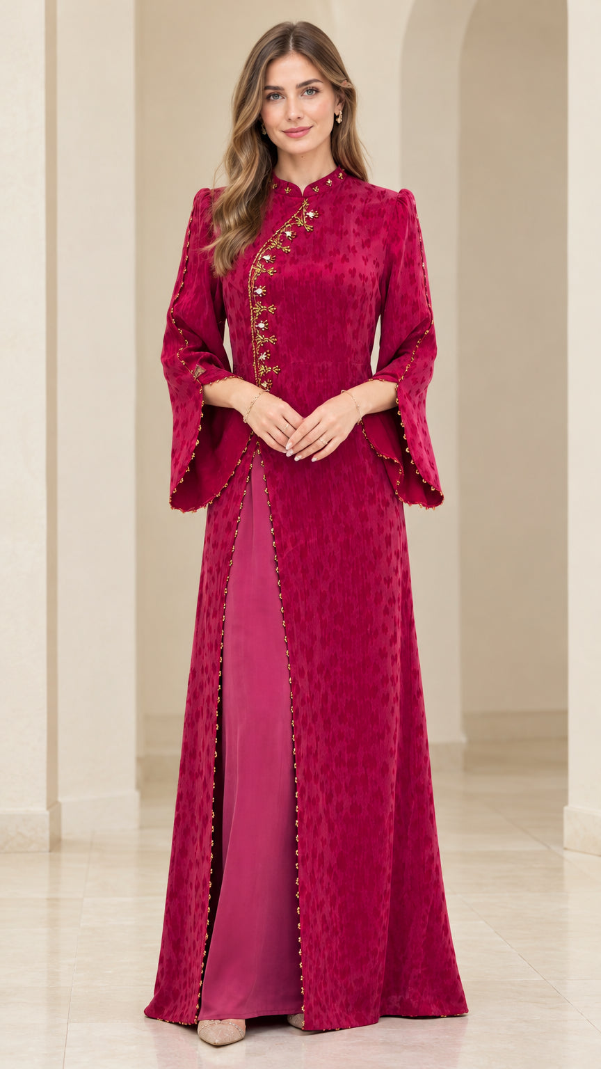 Front full-length view of model wearing the magenta embroidered jacquard split front maxi dress with bell sleeves