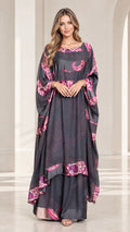 Full front view of model wearing charcoal grey paisley trim draped kaftan maxi dress