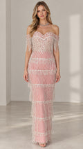 Front view of model wearing off-the-shoulder blush pink beaded fringe maxi evening gown