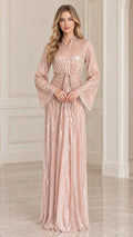 Front view of model wearing Rose Gold long flared sleeve sequin maxi dress