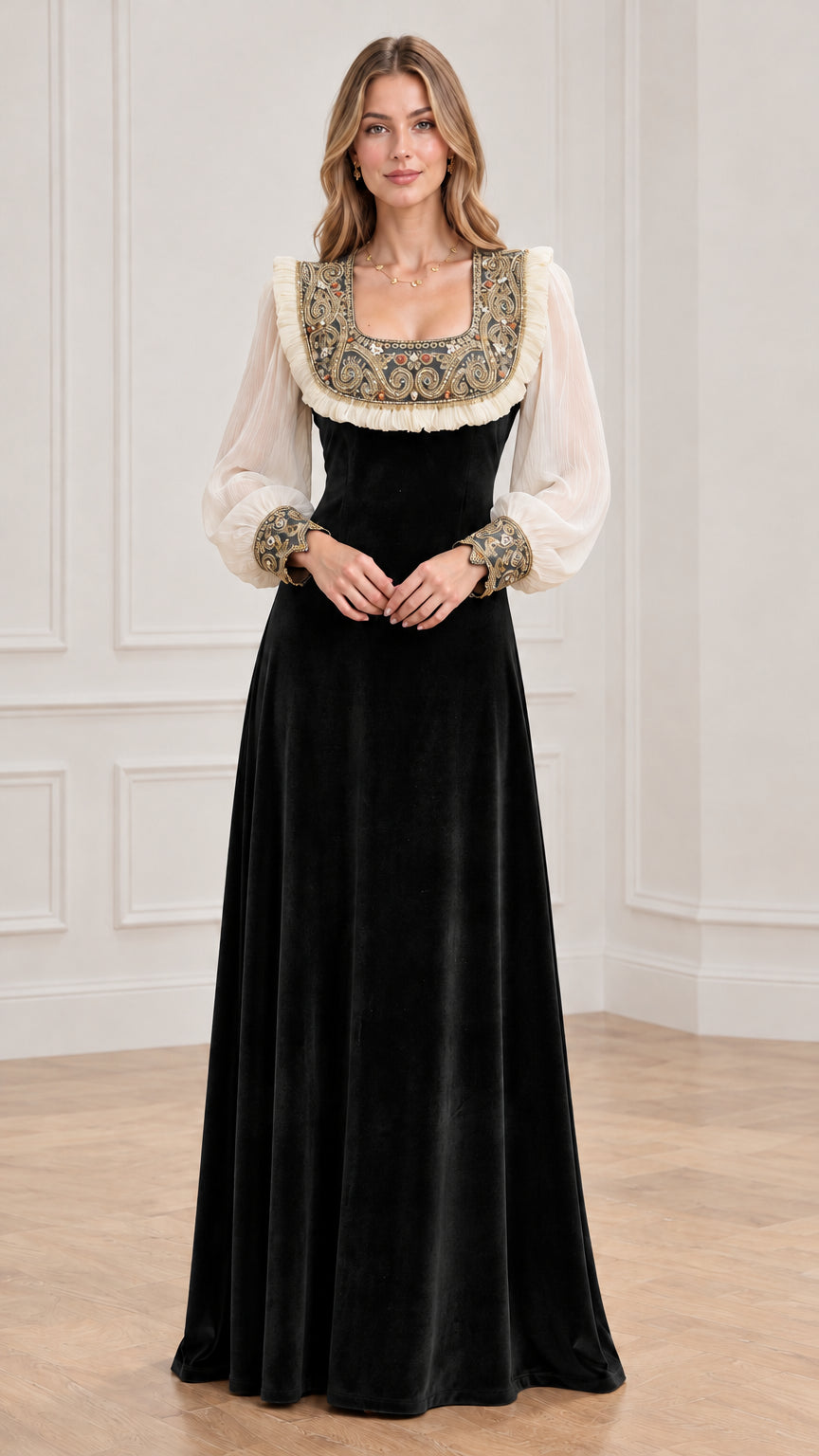 Model wearing black velvet renaissance maxi dress with sheer bishop sleeves
