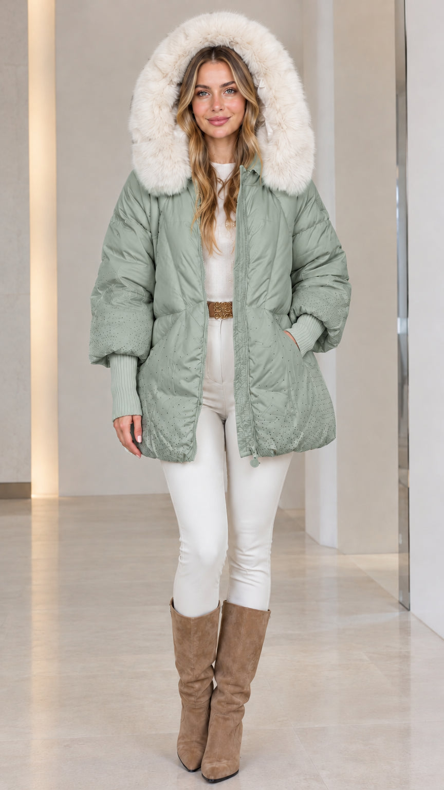 Front view of woman wearing sage green hooded quilted winter puffer coat