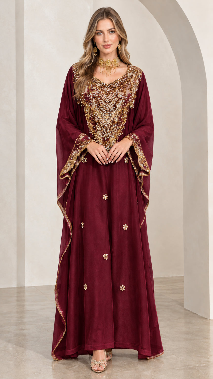 Woman wearing burgundy wine embroidered formal kaftan dress