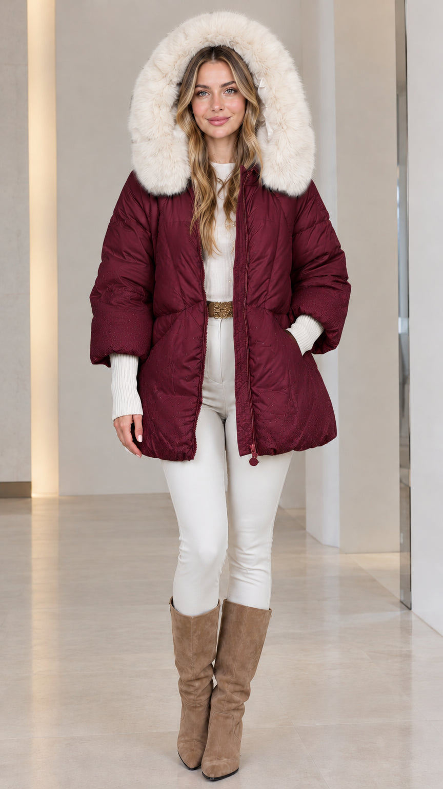 Front view of woman wearing burgundy wine red faux fur hooded puffer coat